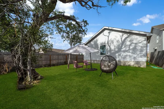 a childrens park with lots of swings and slides