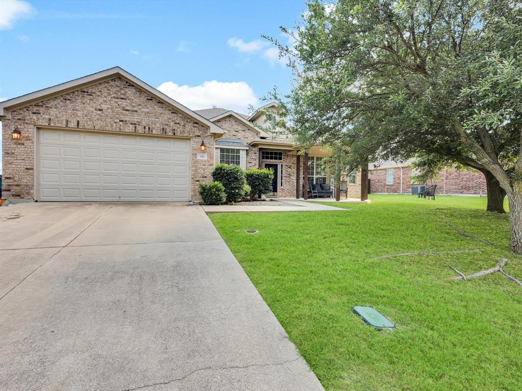 205 King George Road Ponder, TX 76259 - Photo 1 of 32 a front view of house with yard and green space