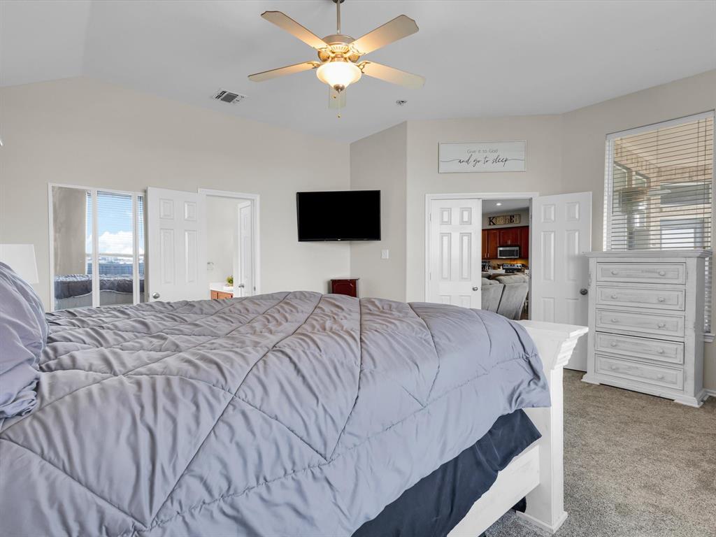 205 King George Road Ponder, TX 76259 - Photo 16 of 32 a bedroom with a bed and a tv