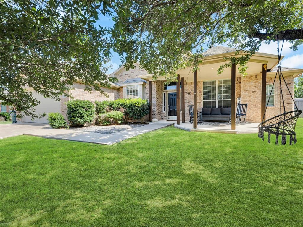 205 King George Road Ponder, TX 76259 - Photo 2 of 32 a view of a house with backyard porch and sitting area