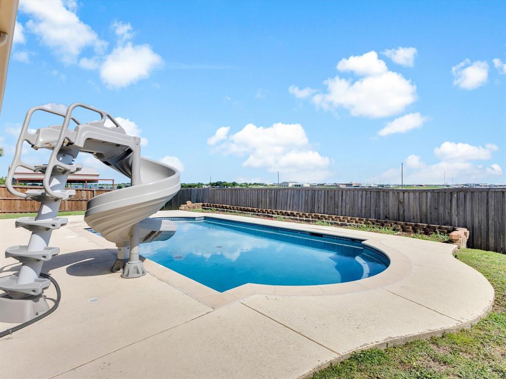 205 King George Road Ponder, TX 76259 - Photo 27 of 32 a view of a swimming pool and lounge chair