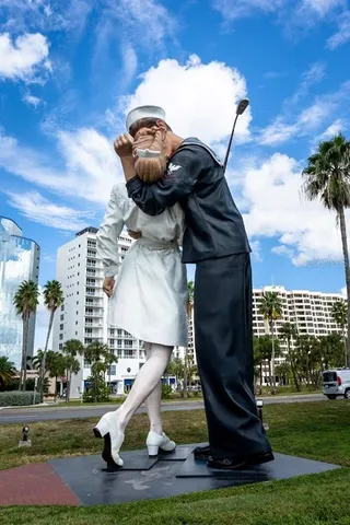 a sign that is on a brick wall