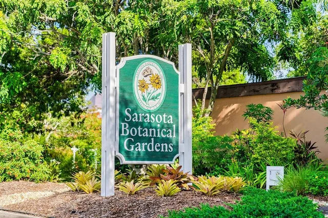 a view of a street with cars