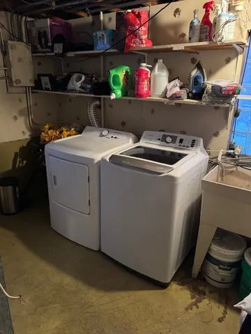 a utility room with dryer and washer