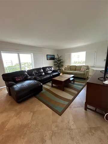 a view of swimming pool from a balcony