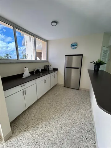 a view of a utility room with a window