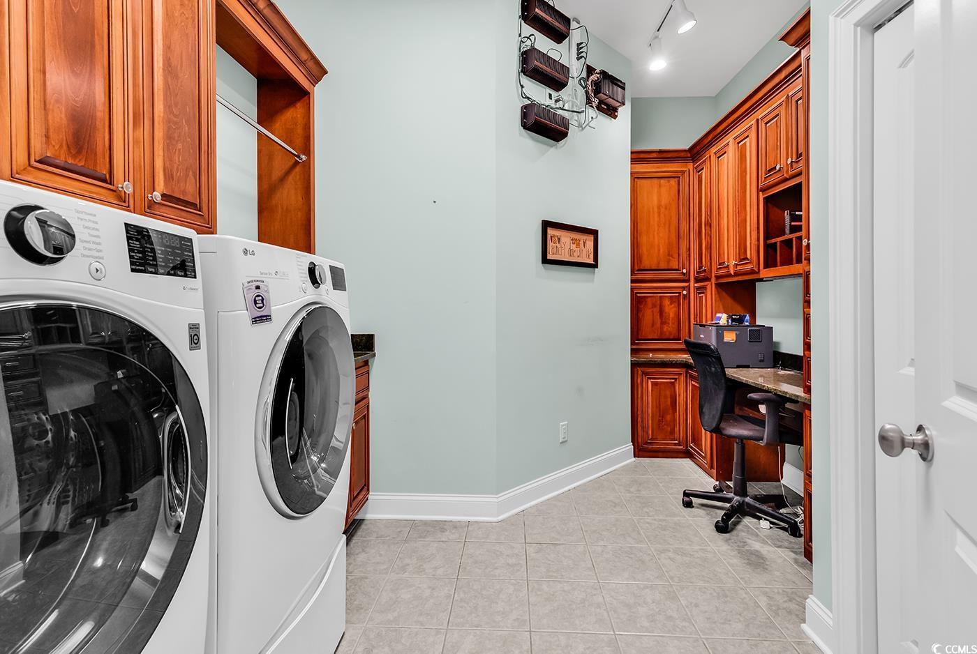 7029 Byrnes Lane Myrtle Beach, SC 29588 - Photo 29 of 40 Laundry area featuring separate washer and dryer, light tile patterned floors, cabinet space, an office area, and track lighting