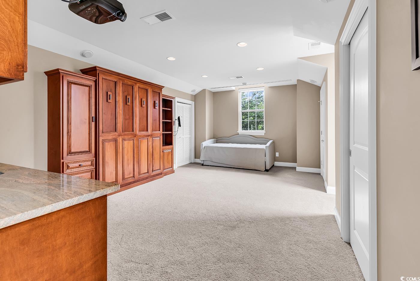 7029 Byrnes Lane Myrtle Beach, SC 29588 - Photo 32 of 40 Unfurnished bedroom featuring light carpet and recessed lighting