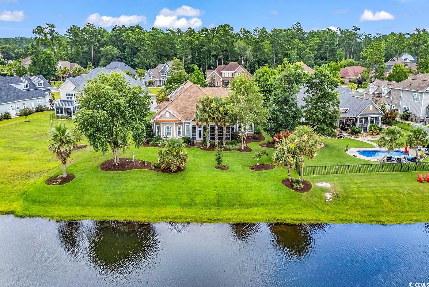 7029 Byrnes Lane Myrtle Beach, SC 29588 - Photo 40 of 40 Aerial view of residential area with a nearby body of water