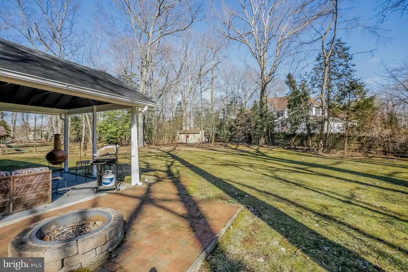 26 Whitby Road Cherry Hill, NJ 08003 - Photo 24 of 31 Built in fire pit in rear yard