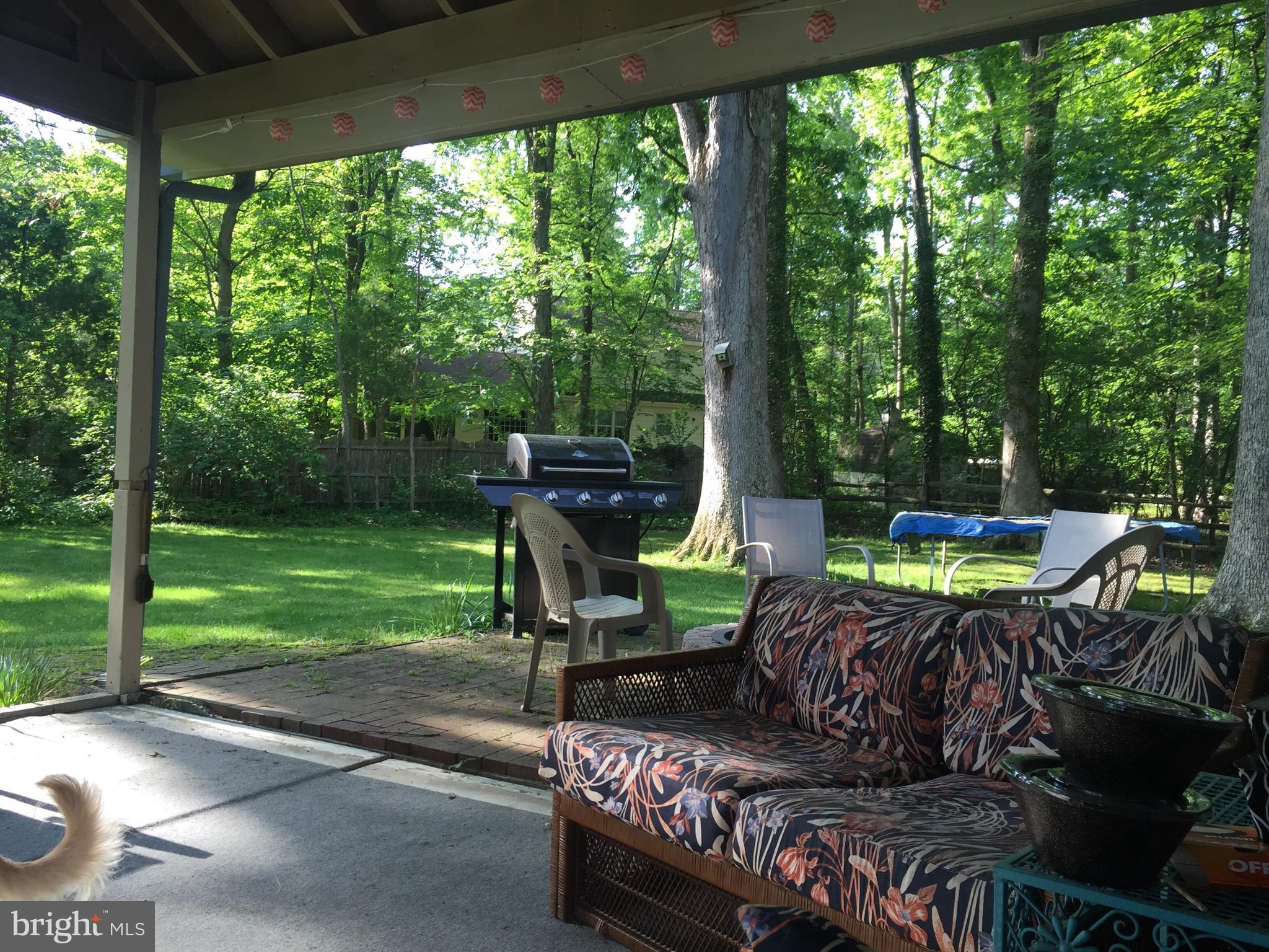 26 Whitby Road Cherry Hill, NJ 08003 - Photo 26 of 31 Rear covered patio in summer