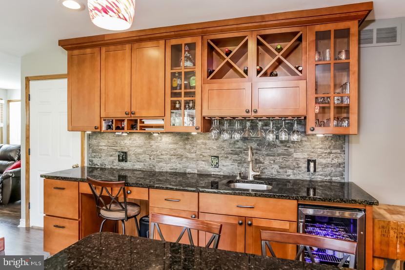 26 Whitby Road Cherry Hill, NJ 08003 - Photo 7 of 31 Kitchen with wine rack and frig