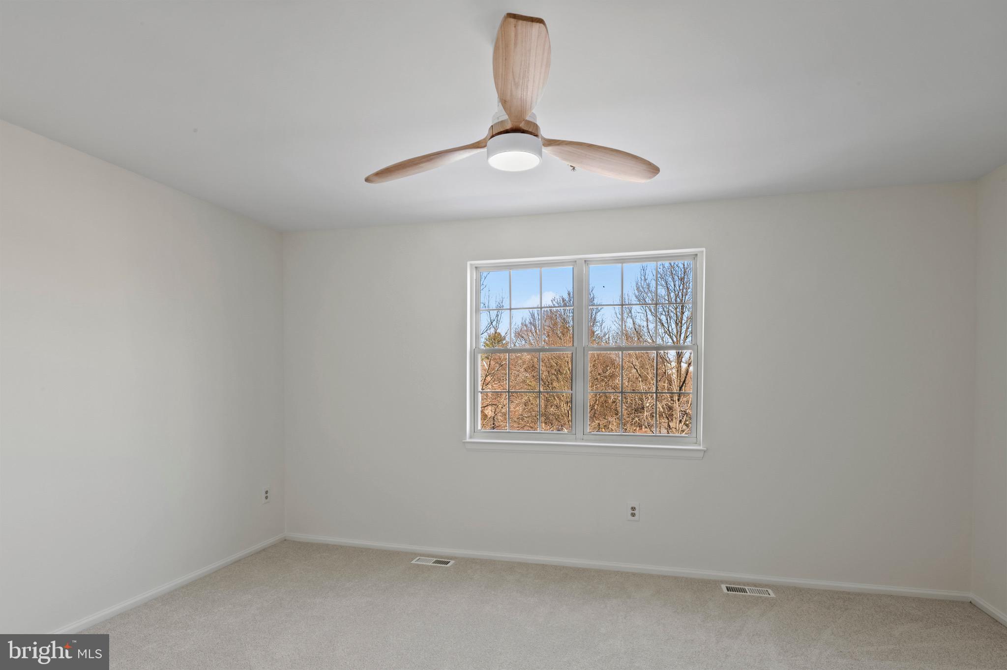6412 Wind Rider Way Columbia, MD 21045 - Photo 13 of 37 an empty room with windows