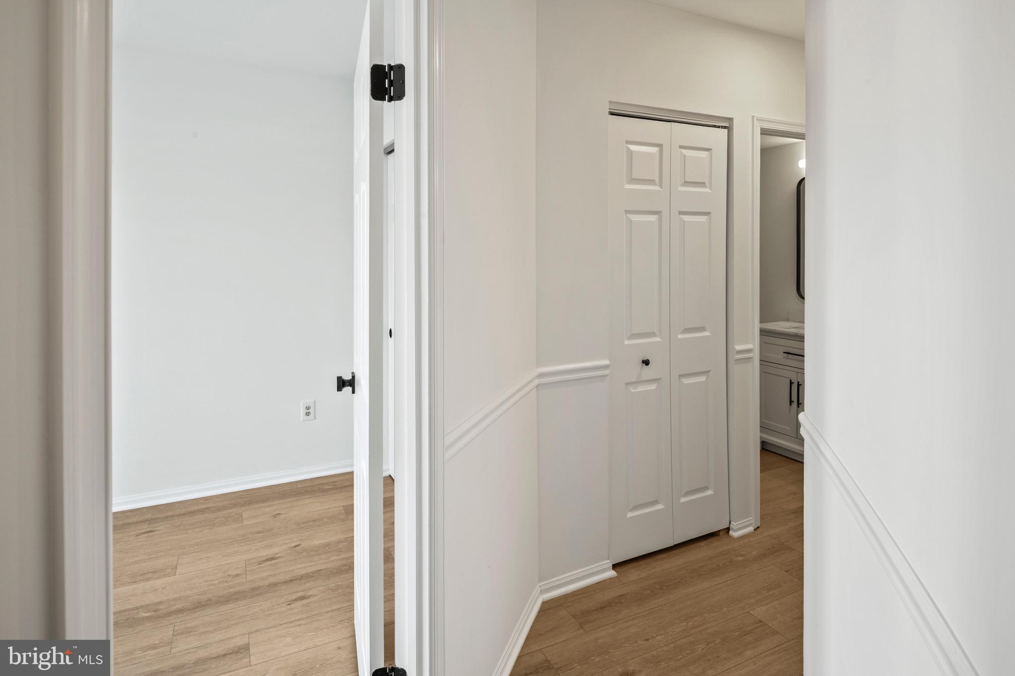6412 Wind Rider Way Columbia, MD 21045 - Photo 29 of 37 a view of a bathroom with wooden floor