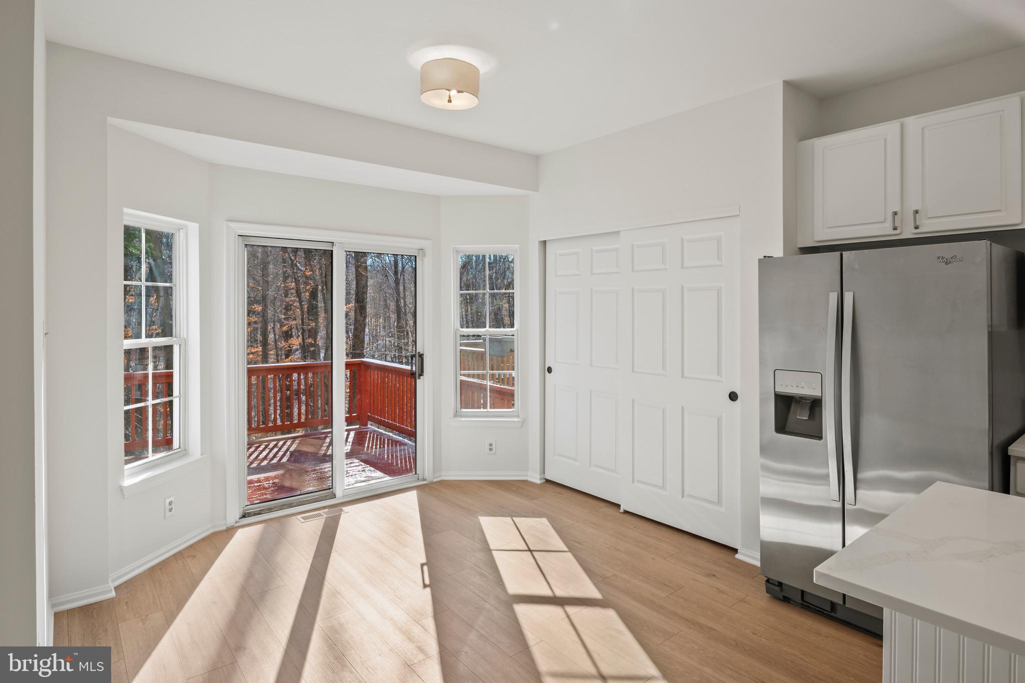 6412 Wind Rider Way Columbia, MD 21045 - Photo 7 of 37 a view of a bedroom with furniture and window