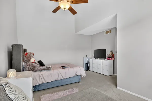 a table and chairs in a patio