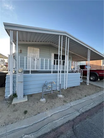 a view of a house with a patio
