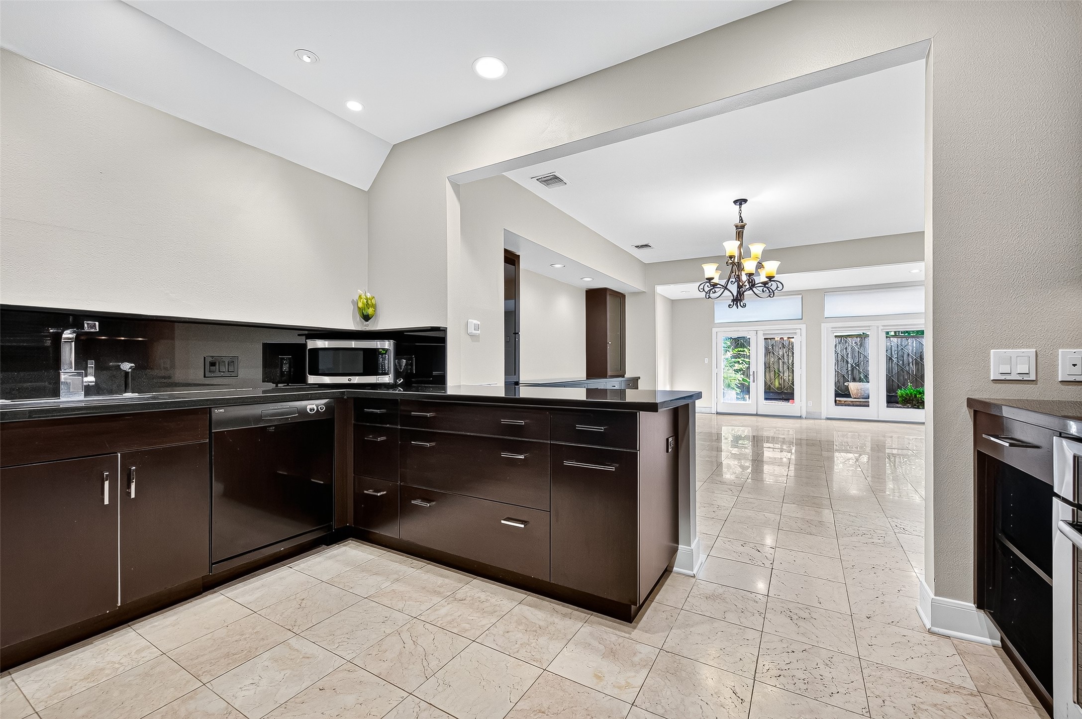 3027 Bissonnet Street Houston, TX 77005 - Photo 19 of 47 Kitchen open to dining and living — you're always part of the conversation