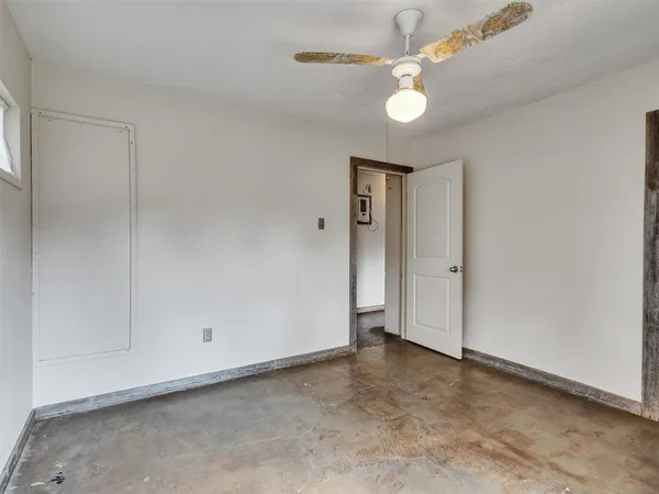 an empty room with windows
