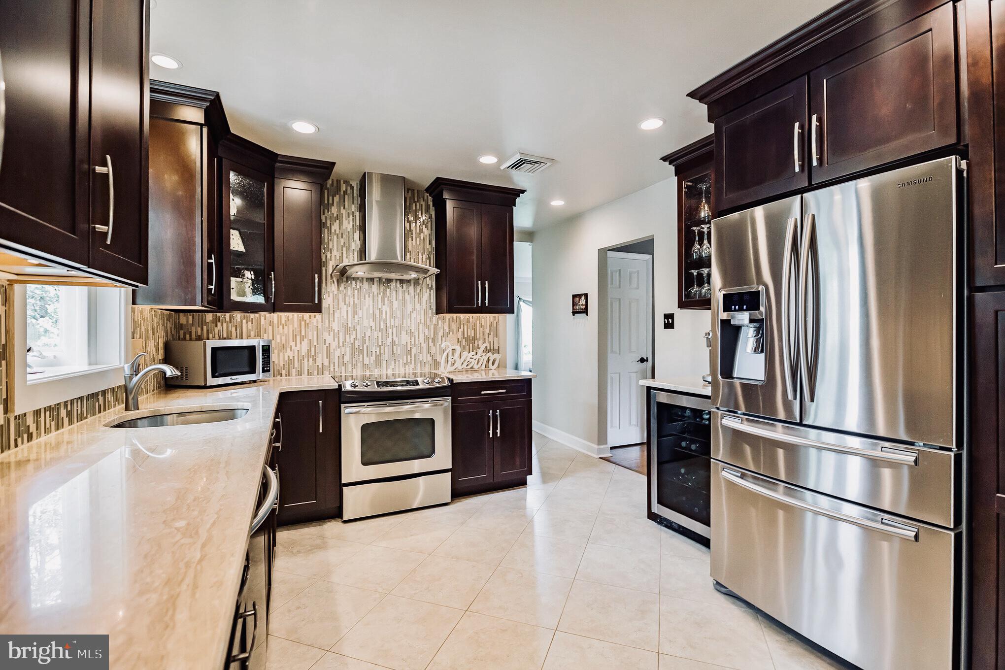 36 Buckwalter Road Audubon, PA 19403 - Photo 8 of 40 SS appliances and wine & beverage frig