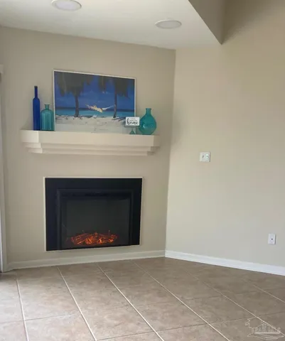 a living room with a fireplace