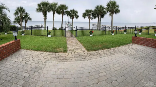 a view of a garden and trees