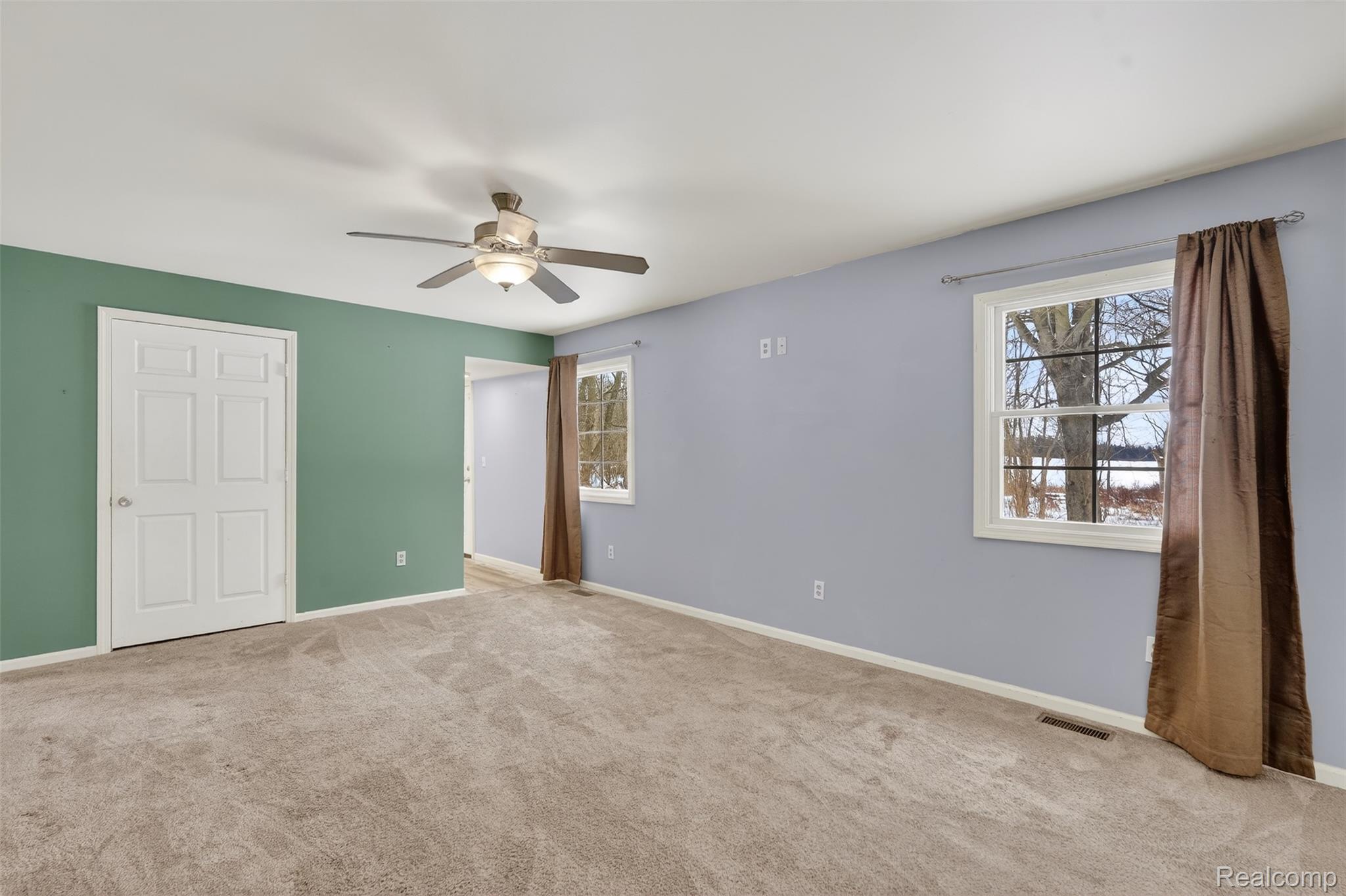 5417 Rensselear Drive Lapeer, MI 48446 - Photo 5 of 41 Unfurnished bedroom with light carpet and a ceiling fan
