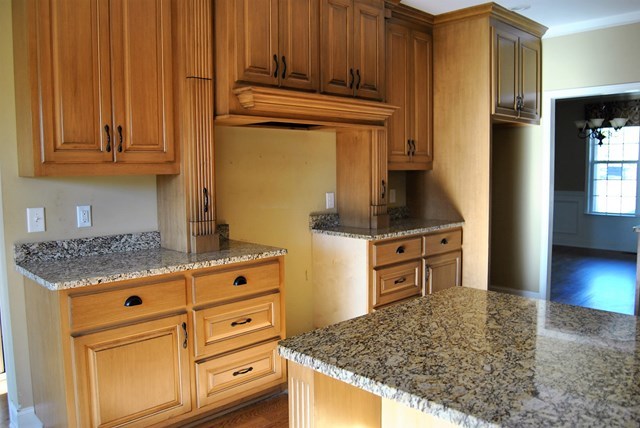 1399 Edge Road Forsyth, GA 31029 - Photo 15 of 31 a kitchen with stainless steel appliances granite countertop a stove a refrigerator and cabinets