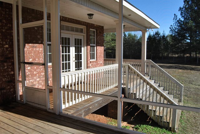 1399 Edge Road Forsyth, GA 31029 - Photo 20 of 31 a view of balcony with wooden floor and outdoor seating