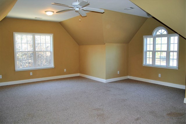 1399 Edge Road Forsyth, GA 31029 - Photo 23 of 31 an empty room with a empty space and windows