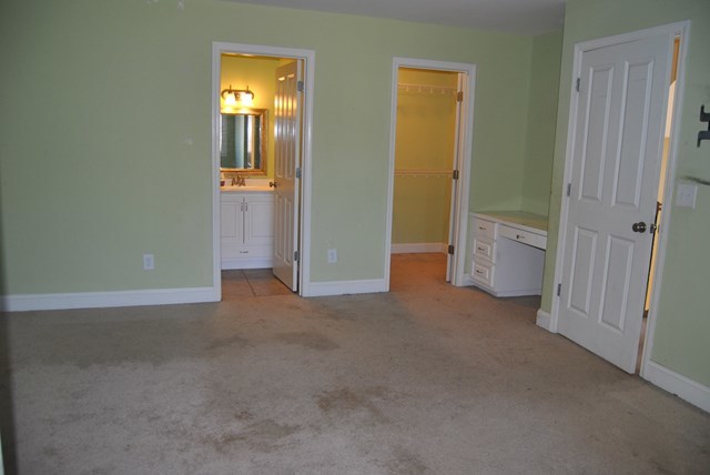 1399 Edge Road Forsyth, GA 31029 - Photo 25 of 31 an empty room with windows and closet