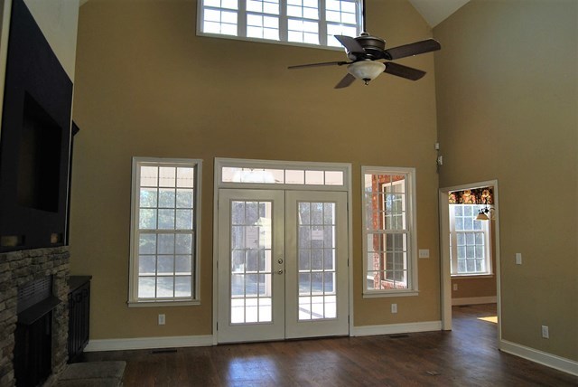 1399 Edge Road Forsyth, GA 31029 - Photo 9 of 31 a view of entryway and hall with wooden floor