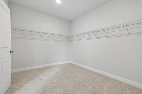 a view of a room with racks on the wall