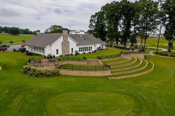 a view of a house with a big yard
