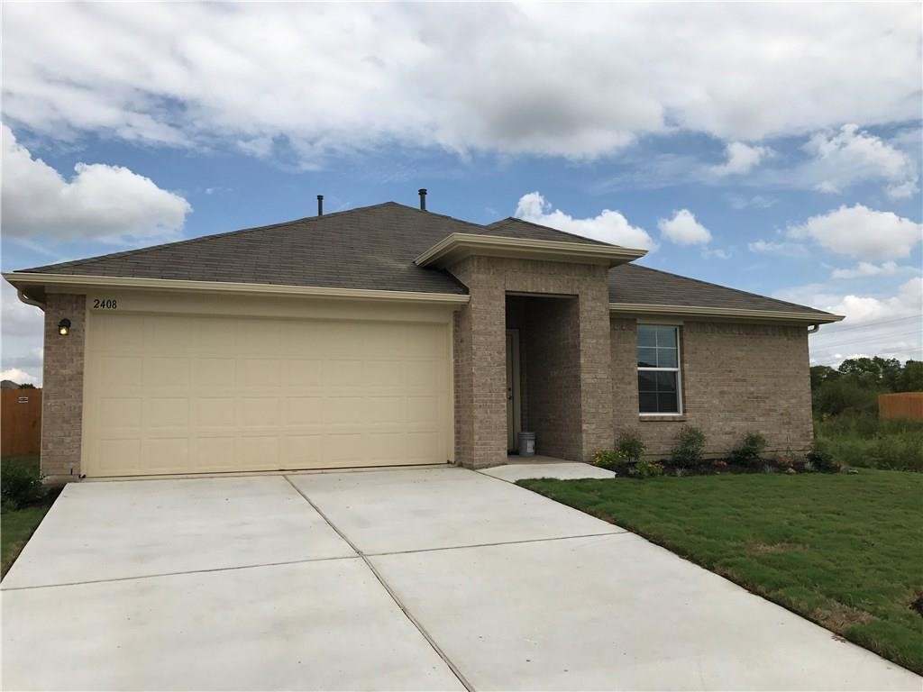 a front view of house with yard