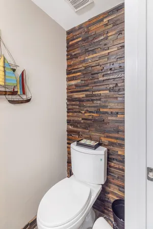 a bathroom with a toilet and a sink
