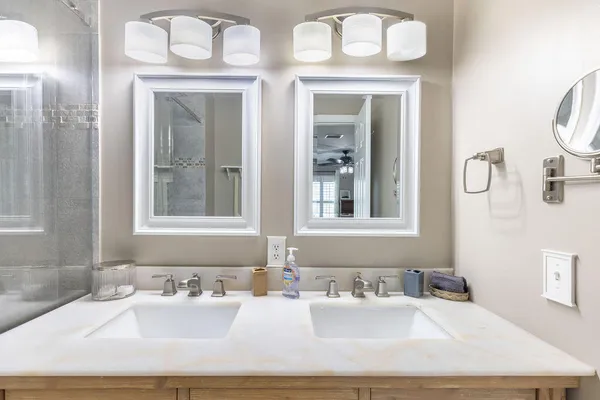 a bathroom with a sink and a mirror