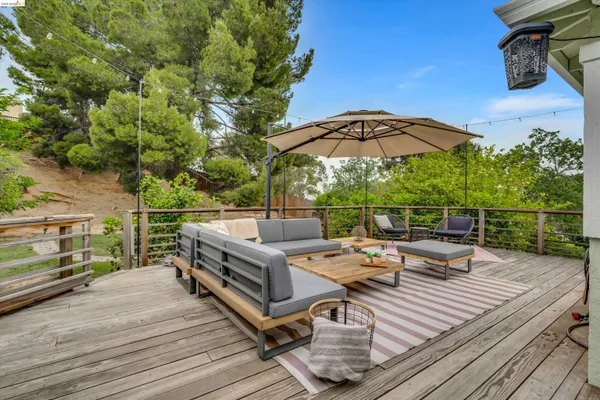 swimming pool view with a seating space