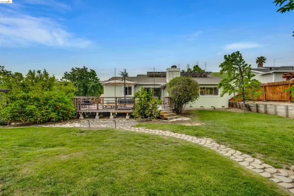 a view of a house with a big yard