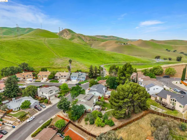 a view of a city with mountains in the background