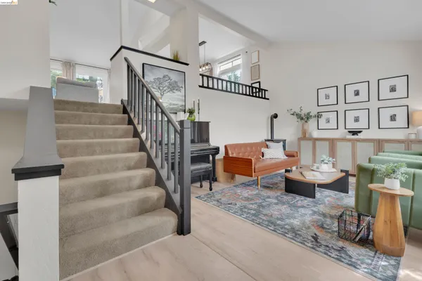 a living room with furniture and white walls