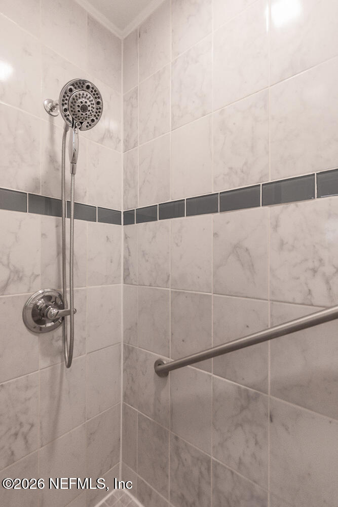 2754 Rainbow Road Jacksonville, FL 32217 - Photo 12 of 25 a bathroom with a shower