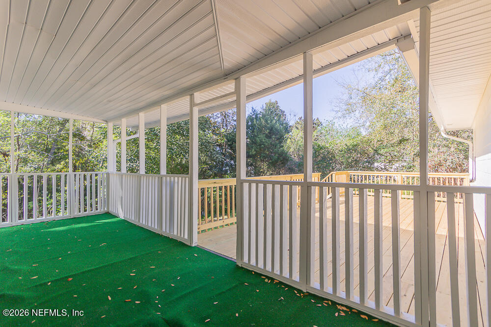 2754 Rainbow Road Jacksonville, FL 32217 - Photo 20 of 25 a view of yard with green trees