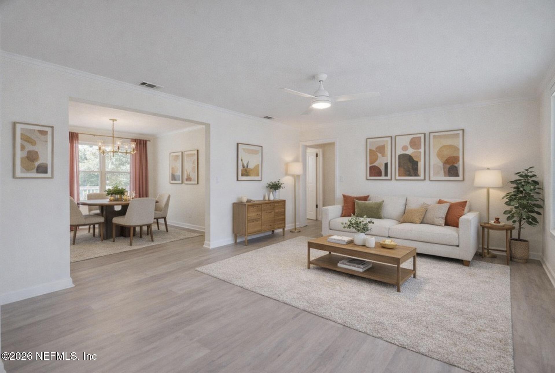 2754 Rainbow Road Jacksonville, FL 32217 - Photo 3 of 25 a living room with furniture and a table