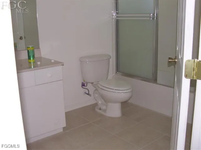 a bathroom with a toilet and a sink