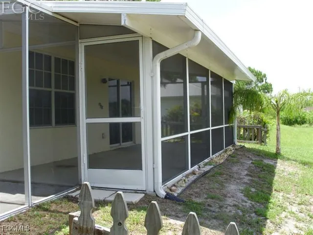 a view of backyard with green space