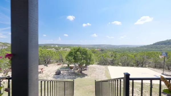 a view of a city from a balcony