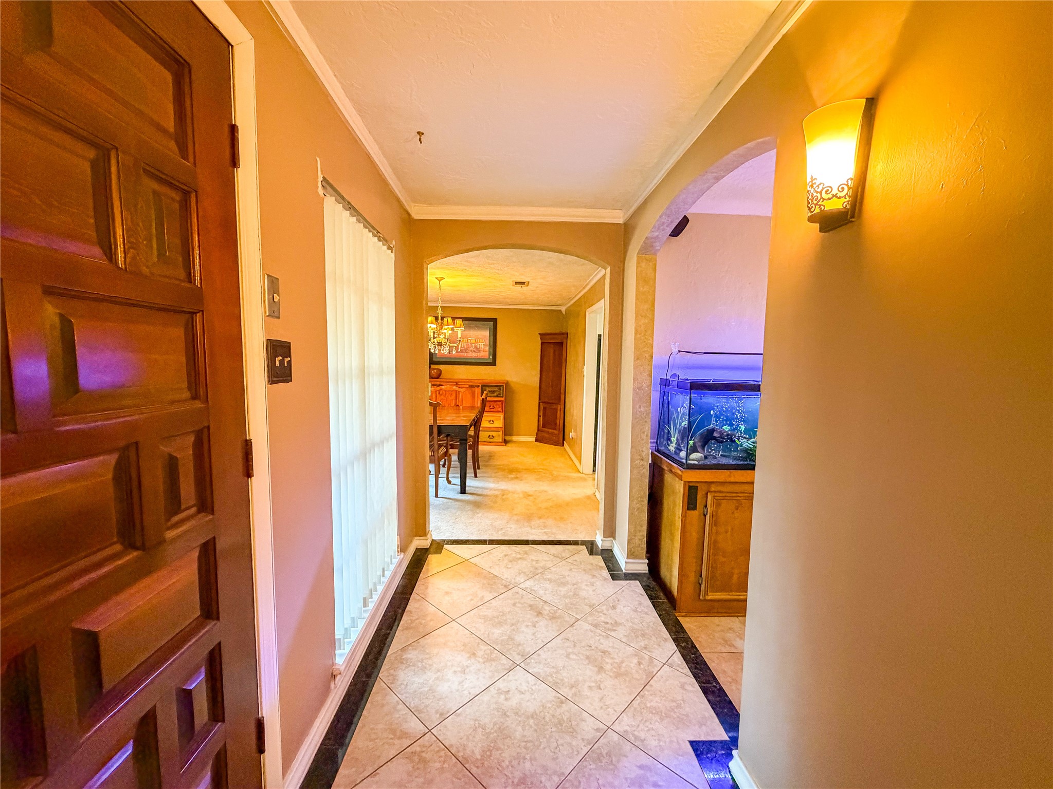 4023 Oxhill Road Spring, TX 77388 - Photo 11 of 18 a view of a hallway and a livingroom with furniture