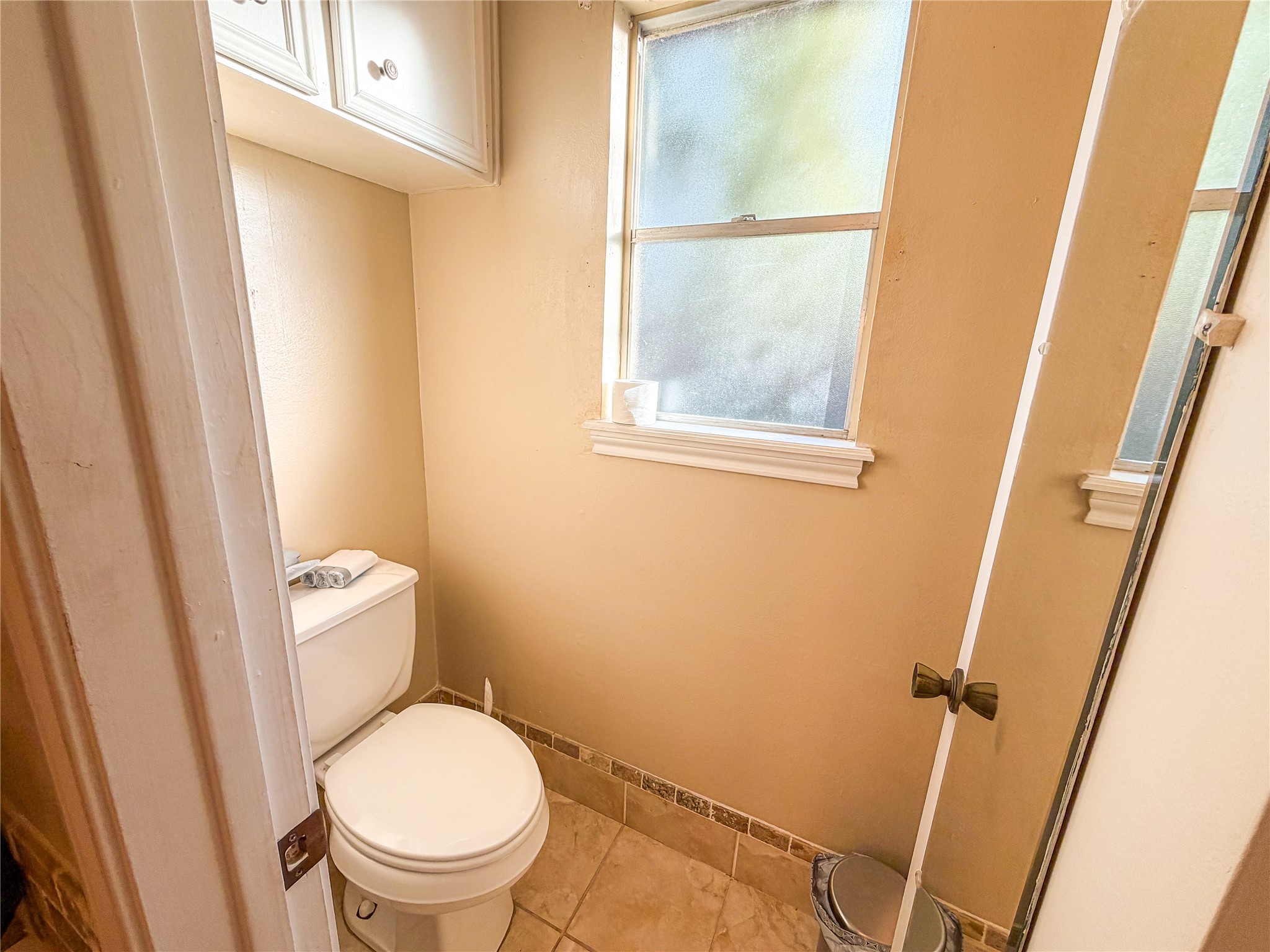 4023 Oxhill Road Spring, TX 77388 - Photo 7 of 18 a white toilet sitting next to a sink