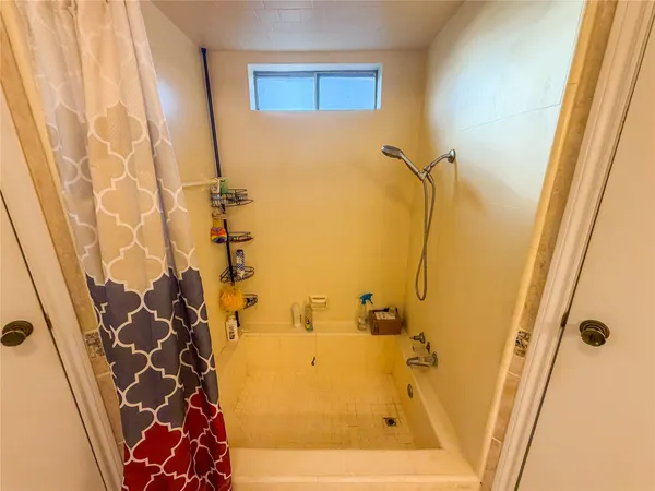 a bathroom with a bathtub